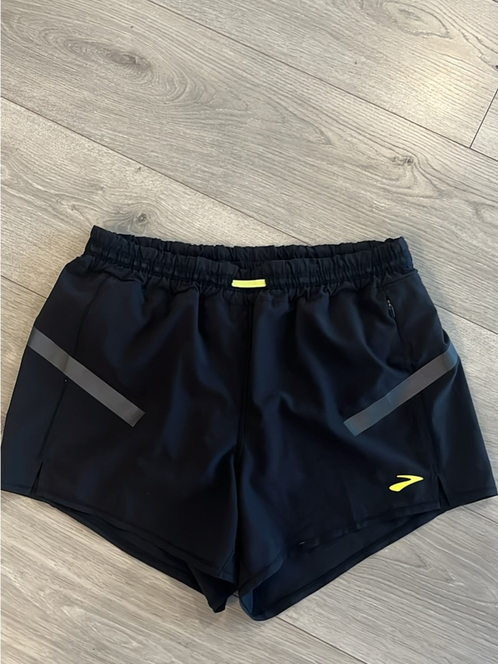 Brooks Black Women's Running Shorts with Neon Yellow Accent